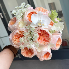 Bridal bouquet with roses and lisianthus