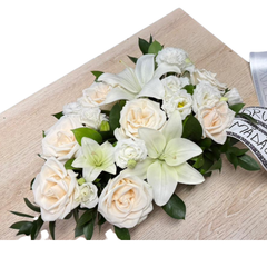 Round funeral wreath with natural flowers