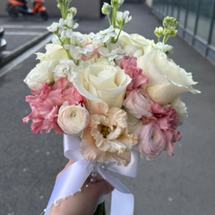 Bridal bouquet with roses and lisianthus