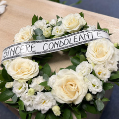 Round funeral wreath with natural flowers