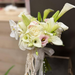 Bridal bouquet with roses and lisianthus