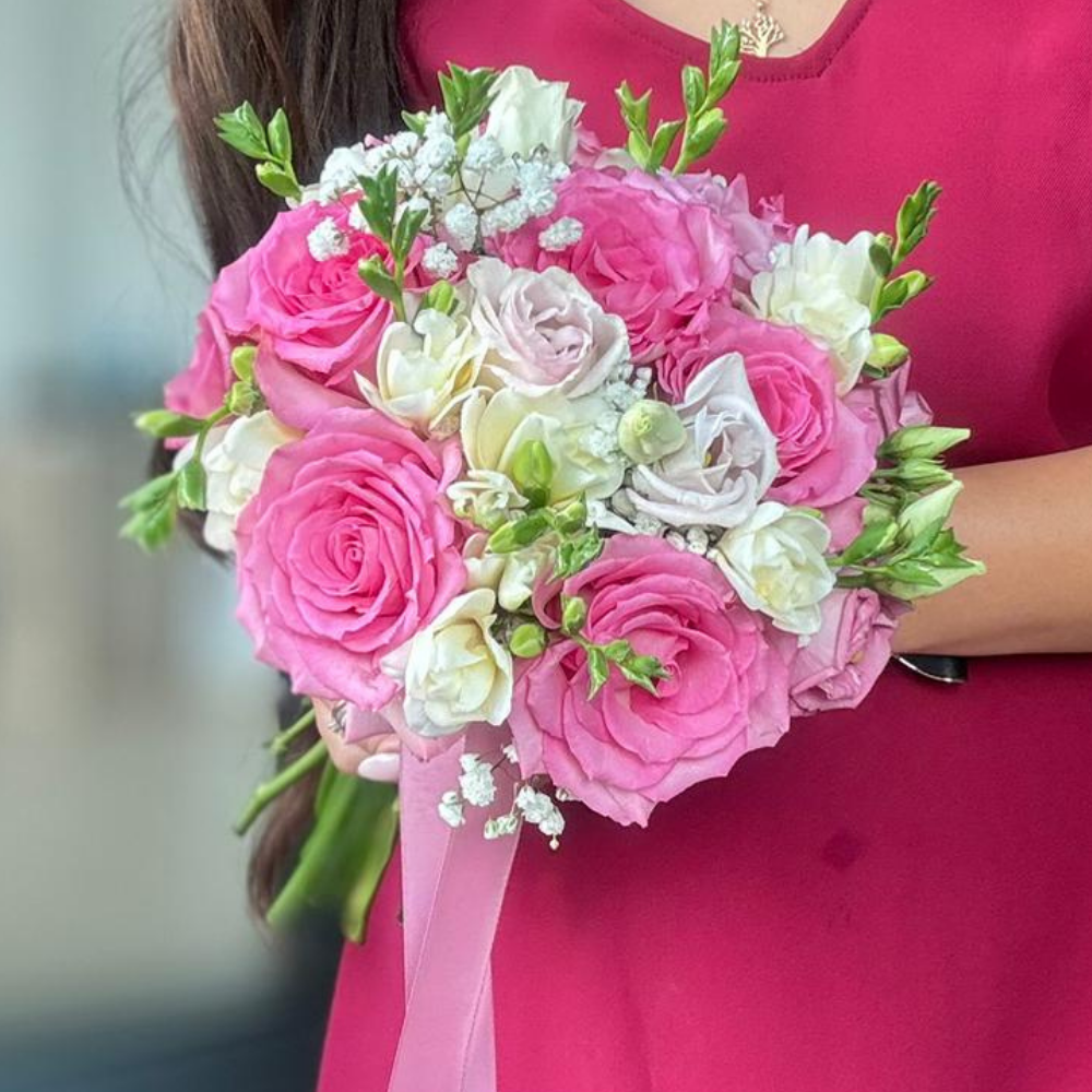 Bridal bouquet with roses and lisianthus